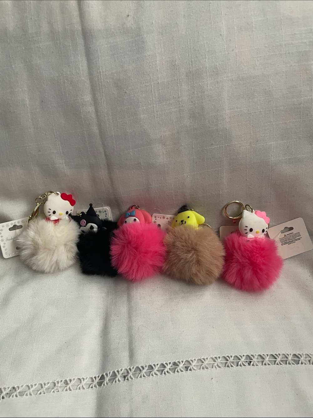 Hello Kitty Plush Pom-Pom Keychain Set in Pink, White, Black, Brown